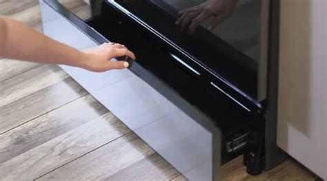 To RemoveOpen up the warming drawer or premium storage drawer to its. . How to remove oven drawer whirlpool
